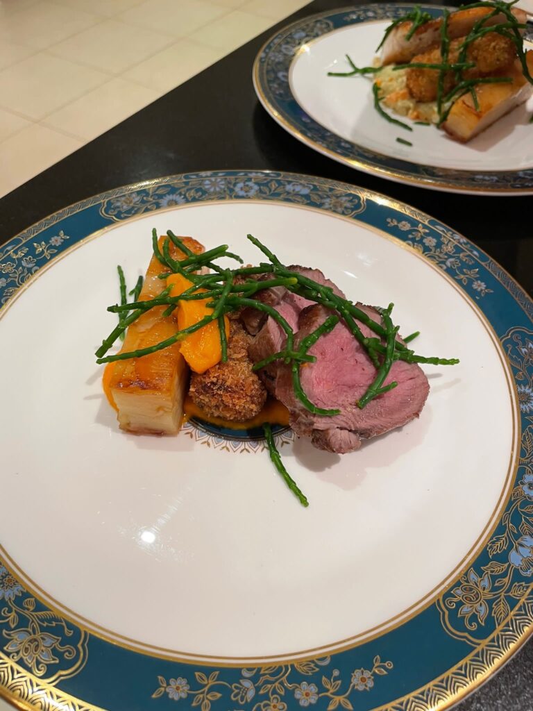 beautiful meat dish with samphire and carrot puree