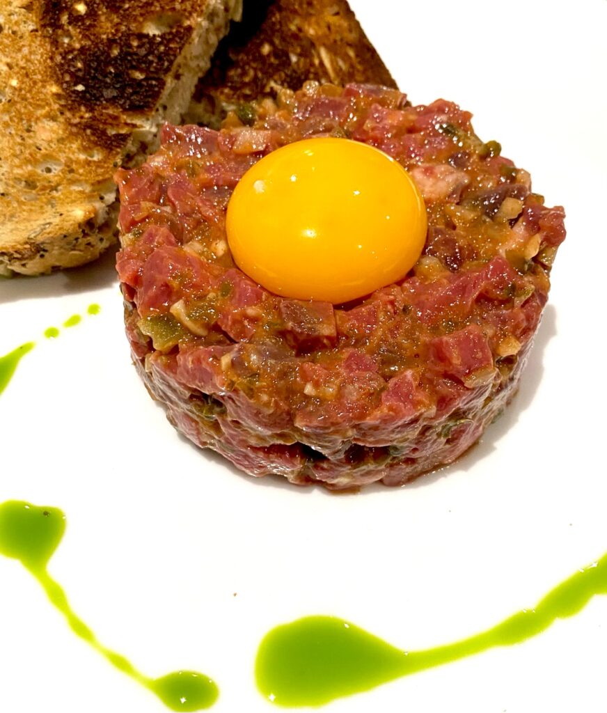 steak tartare with egg confils