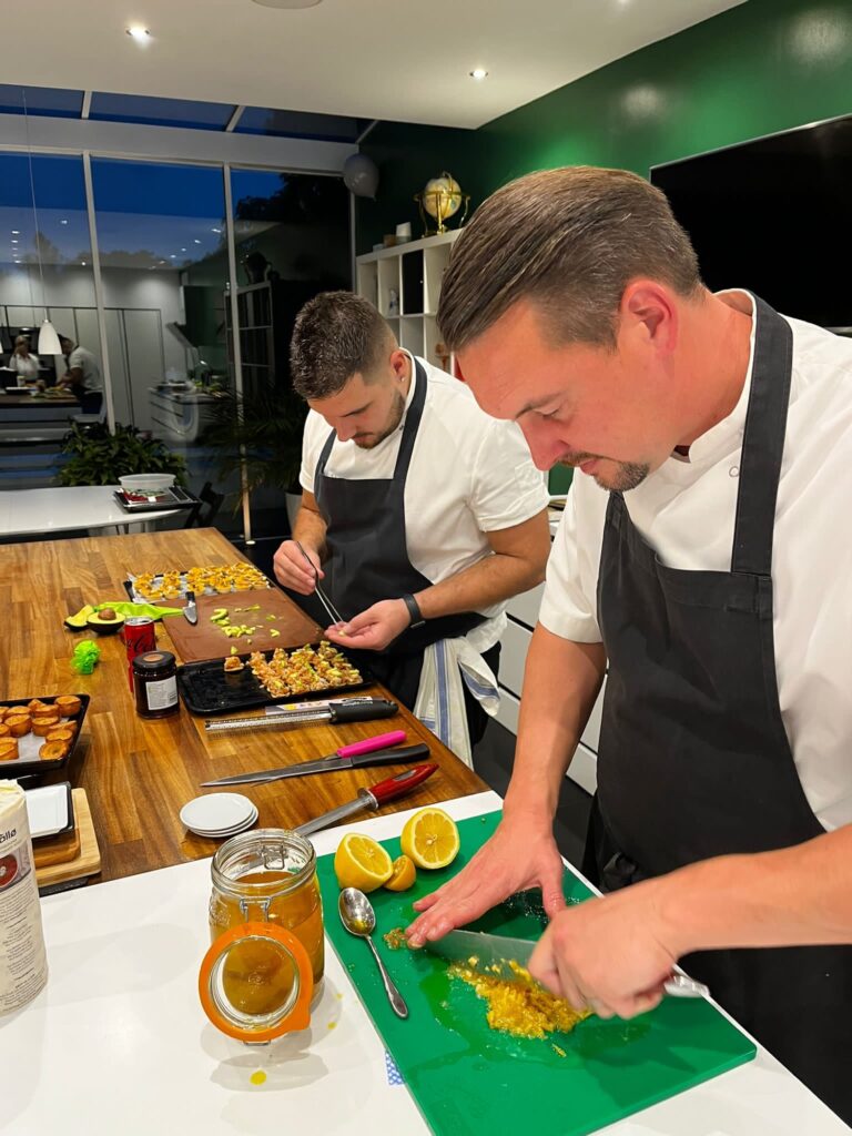 chefs preparing dishes